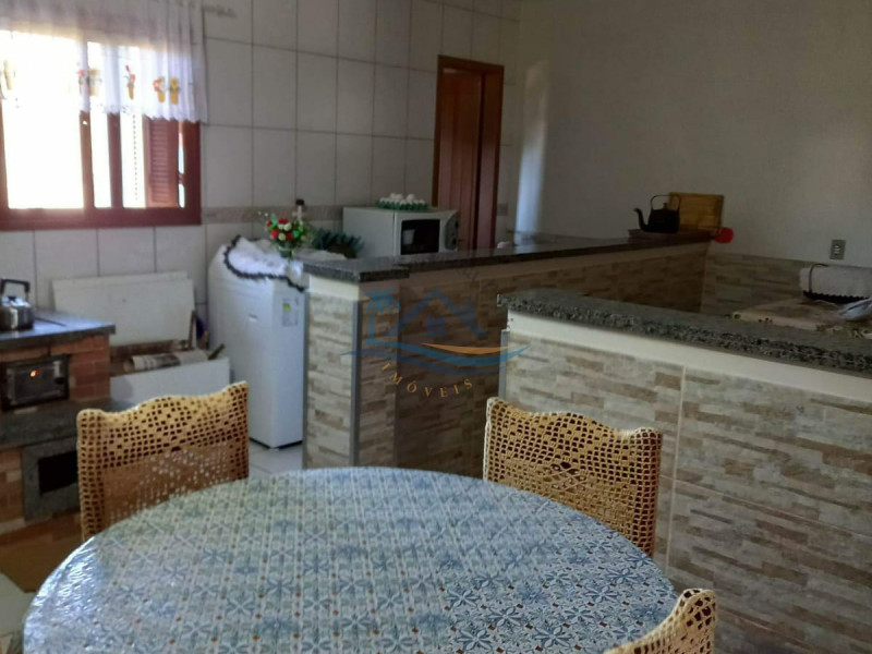 Casa a venda em Arroio do Sal-RS, próximo ao mar.