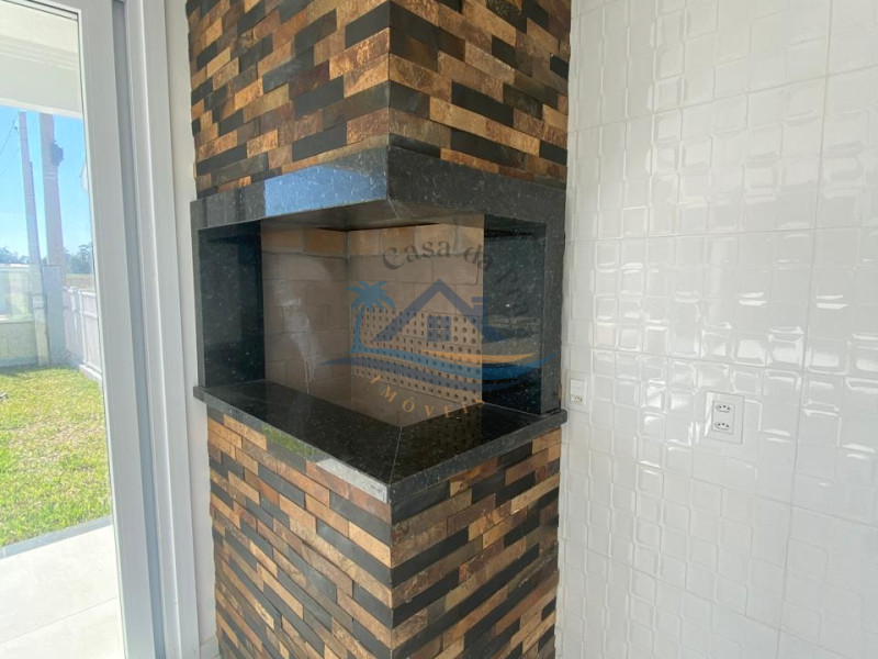 Casa com piscina a venda em Arroio do Sal.