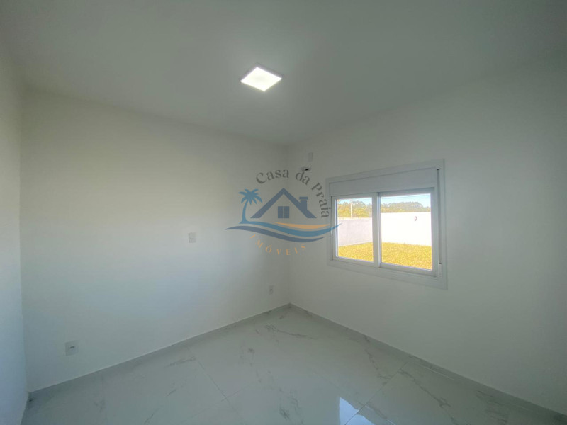 Casa com piscina a venda em Arroio do Sal.